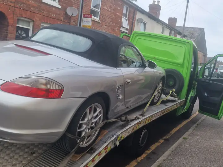 Porsche Boxster on a terraced street